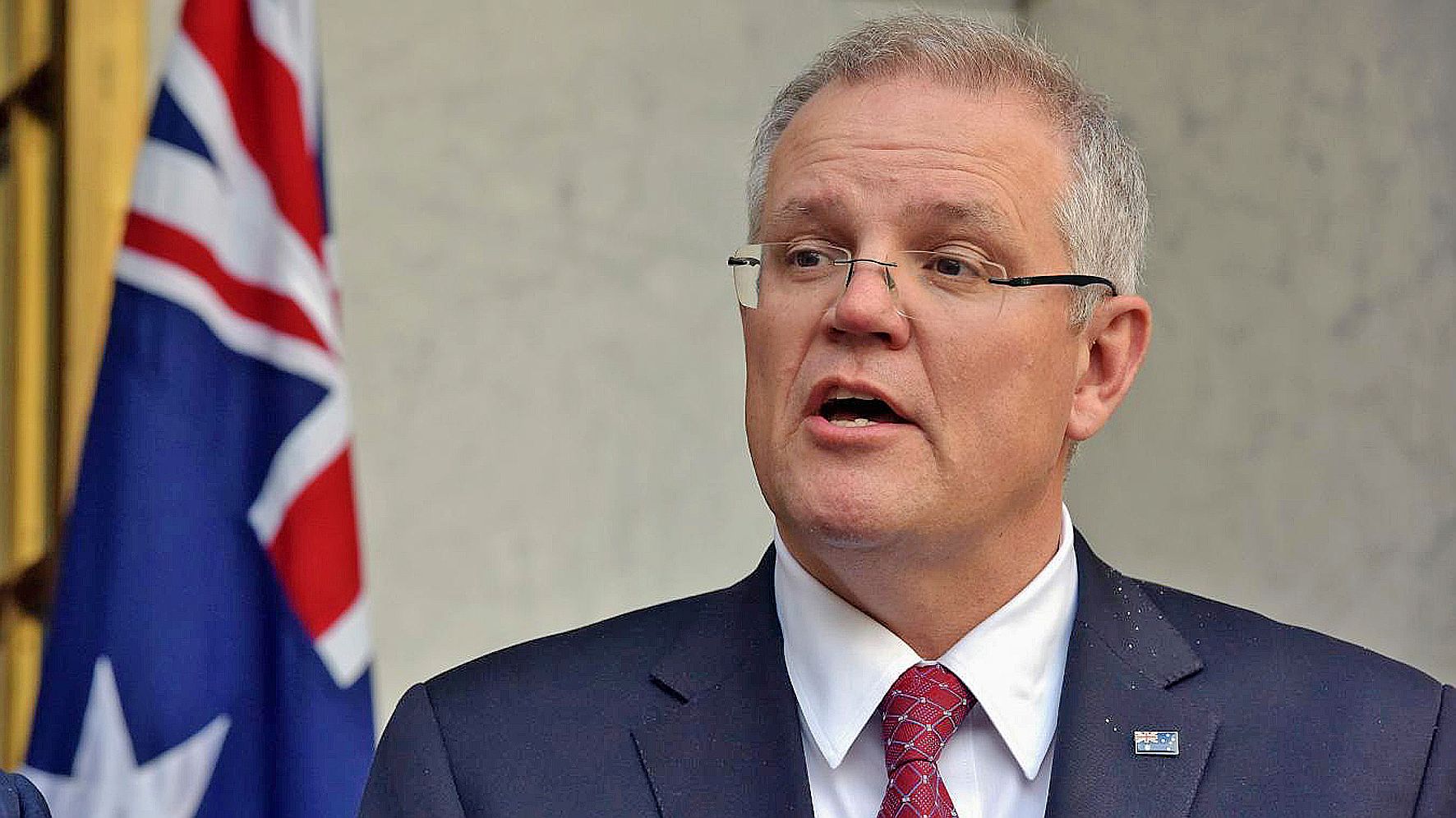 S’il a de nouveau admis qu’il y avait un lien entre les incendies  et le changement climatique, il s’est refusé à revenir sur la politique  du gouvernement favorable à l’industrie minière du charbon. Photo AFP