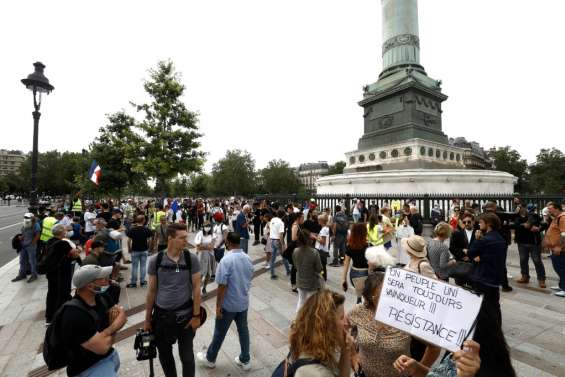 Virus: manifestations anti-restrictions en Australie et en France