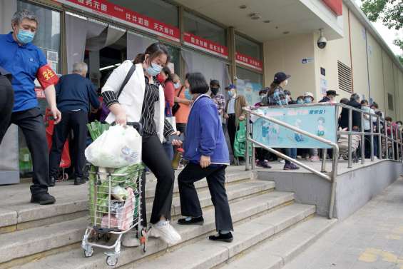 Pékin retient son souffle face à un potentiel confinement