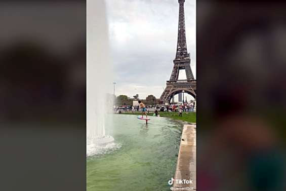 Un calédonien surfe en foil au pied de la Tour Eiffel