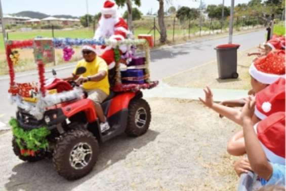 Le père Noël est arrivé  en quad au Pont-des-Français