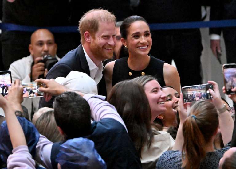 En Australie, le prince Harry et Meghan proposent des évènements à prix d'or